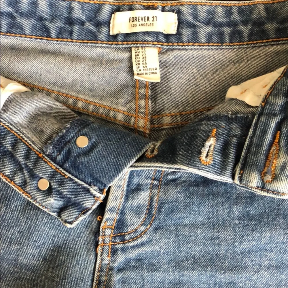 Forever 21 Raw Hem Button Up Denim Shorts size 27